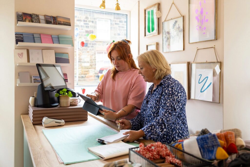Business Owners Checking Online Stock